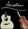 Pierre plays his signature model Lowden Guitar